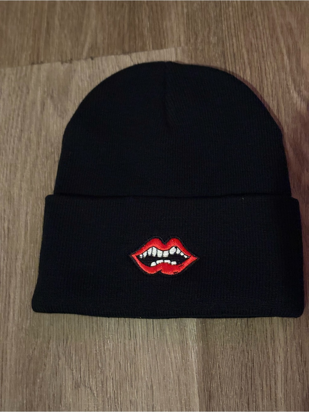 Designer black knit beanie